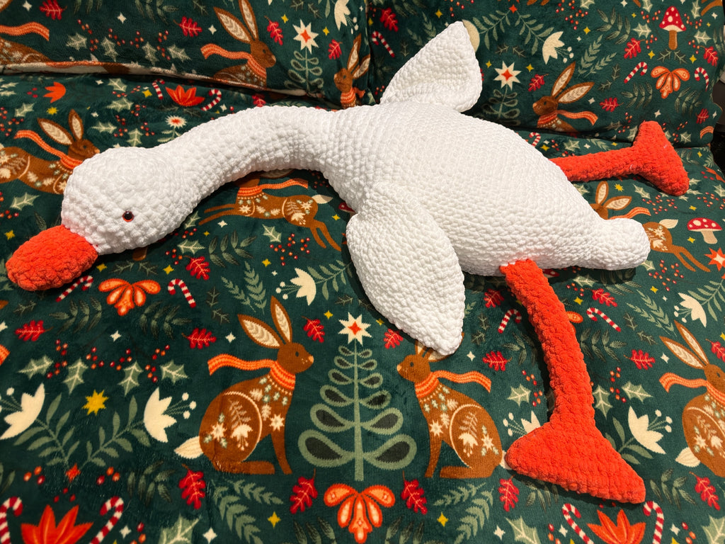 Oversized handmade crochet goose plush toy, soft and cuddly blanket yarn body pillow style stuffed animal
