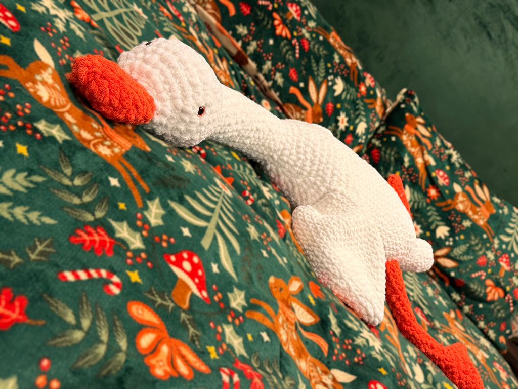 Oversized handmade crochet goose plush toy, soft and cuddly blanket yarn body pillow style stuffed animal